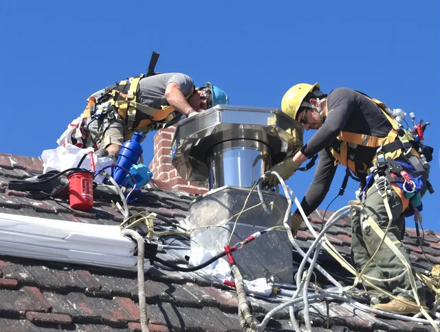 Protective chimney cap installed by Acushnet Chimney Sweep in Acushnet, MA