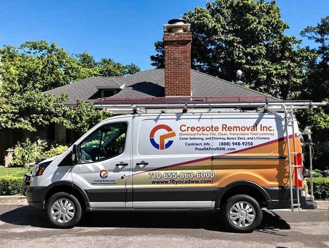Acushnet Chimney Sweep technician removing creosote safely in Acushnet, MA